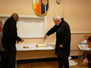 Bp Pat cutting cake